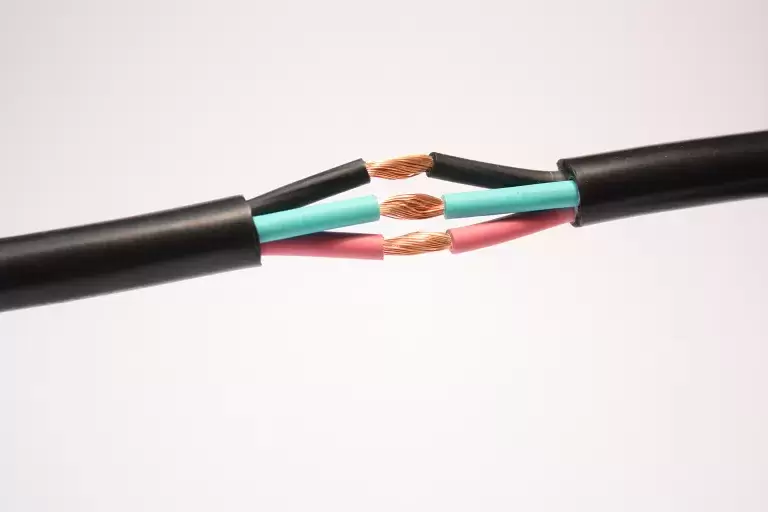 Three wires blue, black and pink colored inside one wrapper that is in black color.